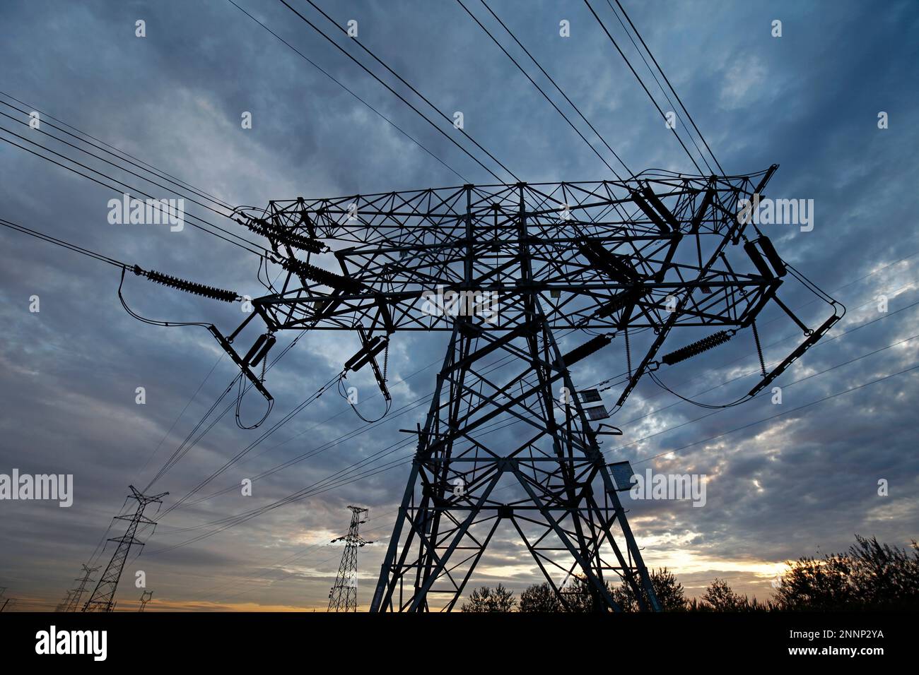 High voltage electric tower line Stock Photo - Alamy