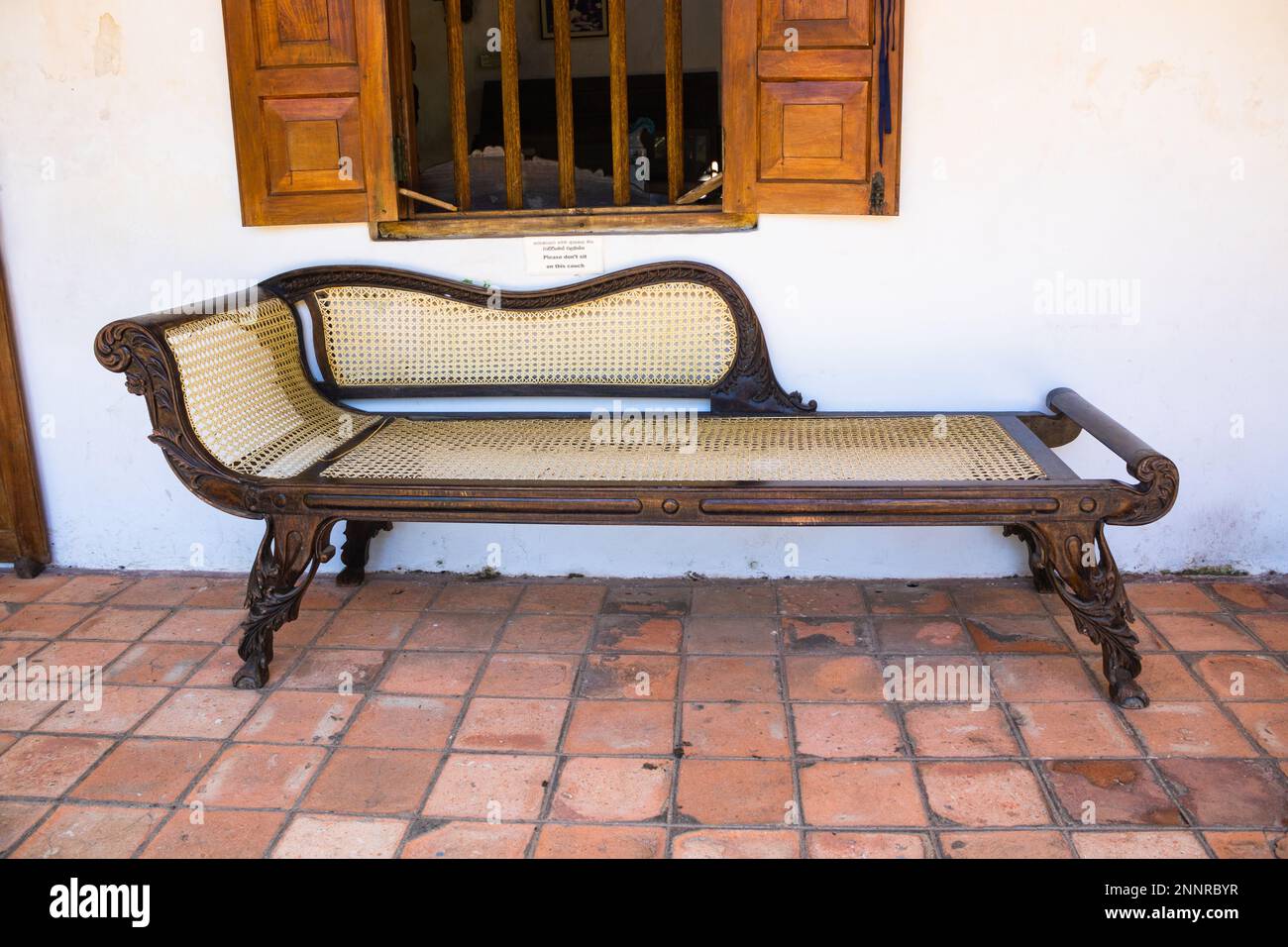 Victorian Style Cane Seat And Back Fainting Couch ,koggala museum, sri lanka. Stock Photo