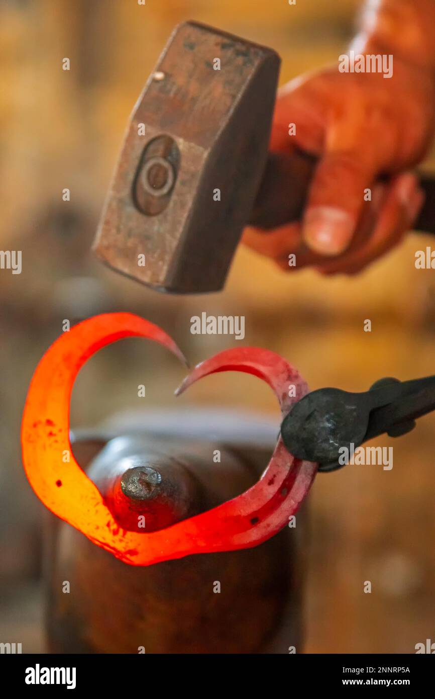 Forge a heart of iron Stock Photo - Alamy