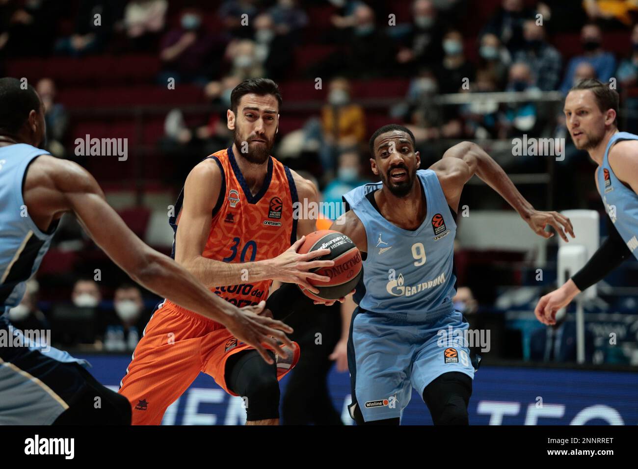 ST PETERSBURG, RUSSIA - FEBRUARY 25: Joan Sastre of BC Valencia and Austin  Hollins of BC Zenit in actionl during EuroLeague match BC Zenit Saint  Petersburg v BC Valencia on February 25,