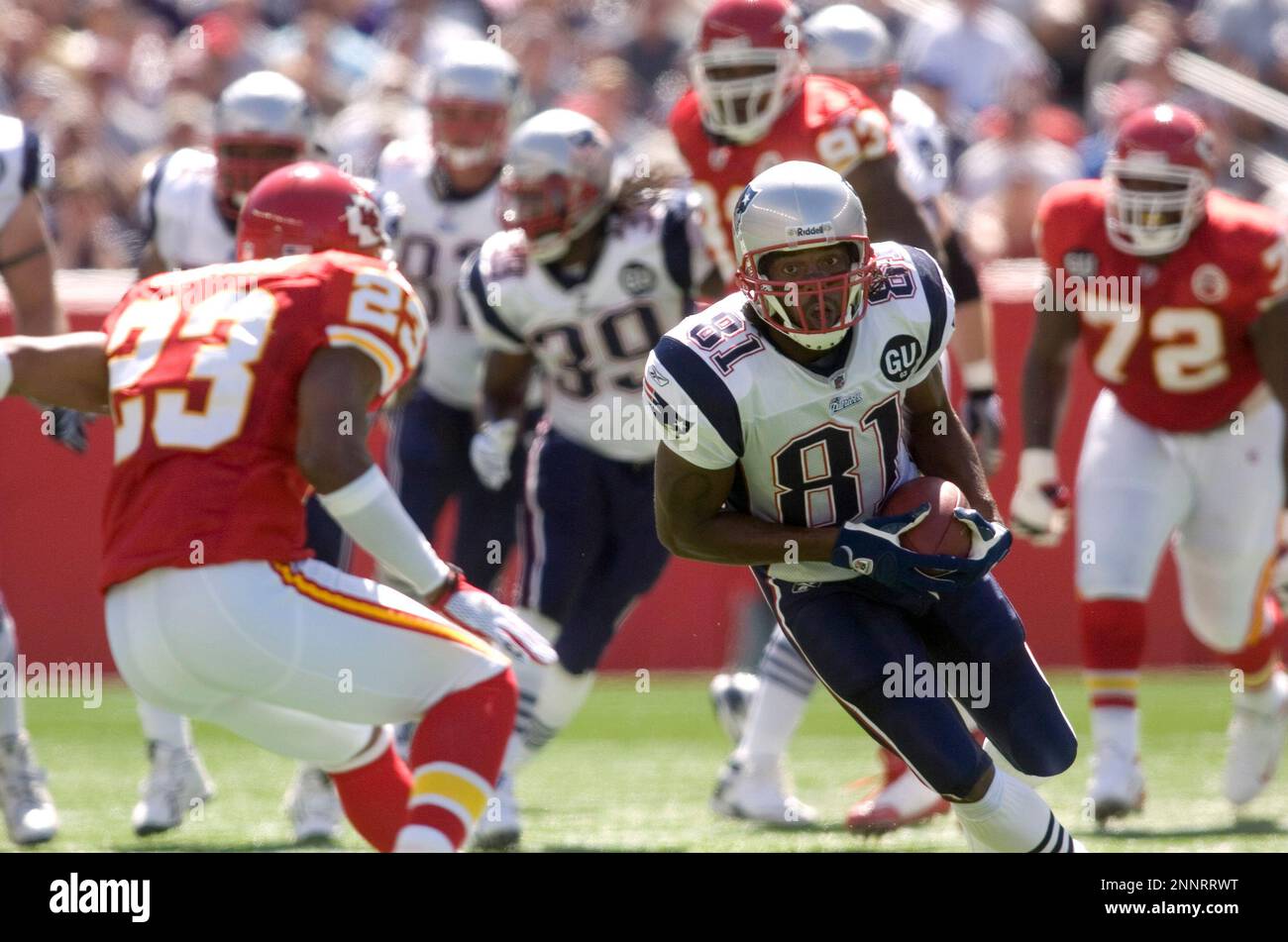 New England Patriots wide receiver Randy Moss (81) catches a pass before  running for a 71-yard touchdown against the Miami Dolphins at Gillette  Stadium in Foxboro, Massachusetts on November 8, 2009. The