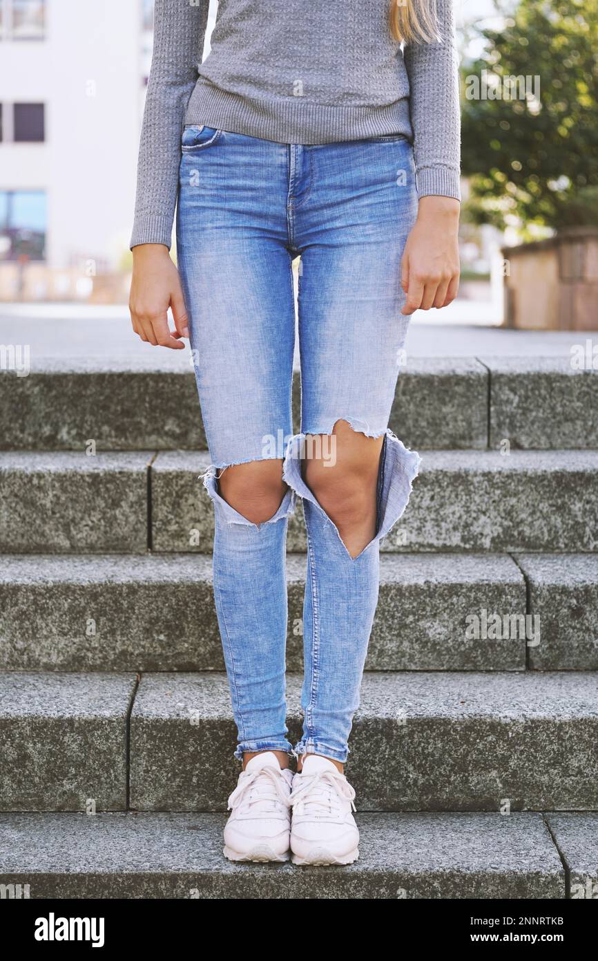 Premium Photo | Torn pants torn jeans close up girl wear jean women knees  in jeans holes in jeans fashion clothing hips and knees in fashionable jeans