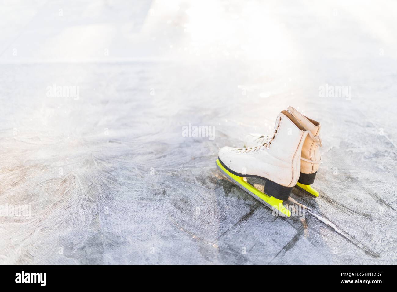 figure skates cracked ice Stock Photo Alamy