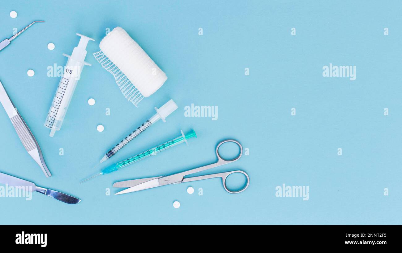 overhead view medical equipment s blue background Stock Photo Alamy