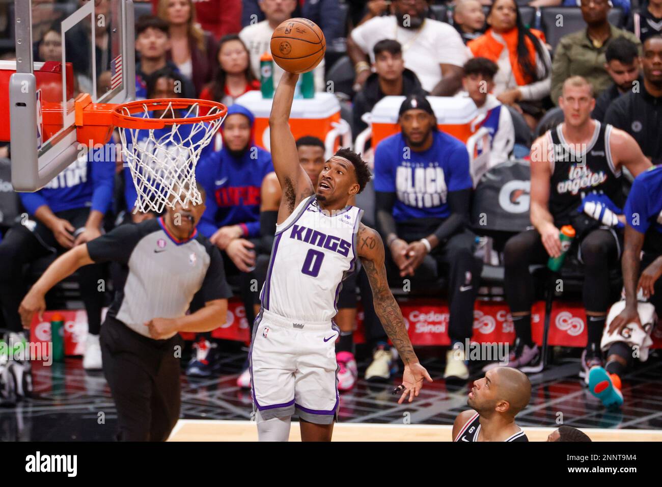 Los Angeles, United States. 24th Feb, 2023. Sacramento Kings guard Malik Monk dunks against the Los Angeles Clippers during an NBA basketball game. Kings 176:175 Clippers Credit: SOPA Images Limited/Alamy Live News Stock Photo