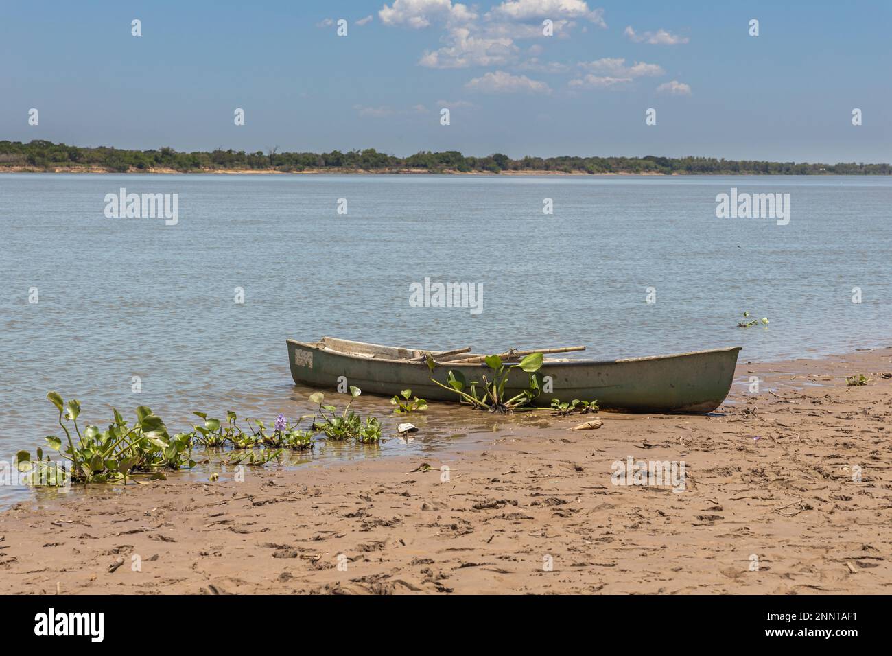 Fishing boat by a river bank hi-res stock photography and images - Alamy