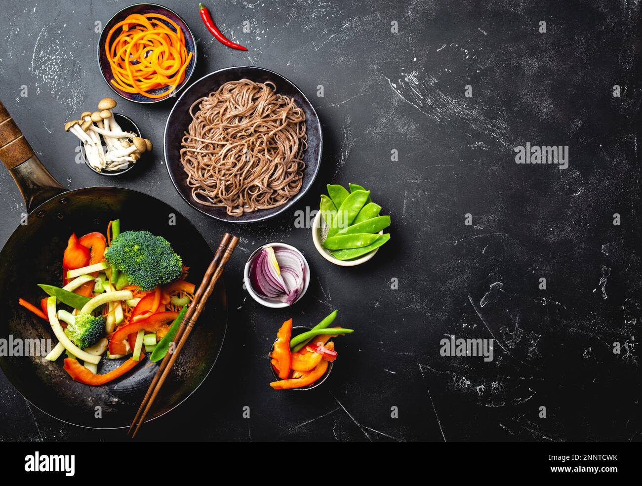 Ingredients for making stirfried noodles soba. Cut fresh vegetables in