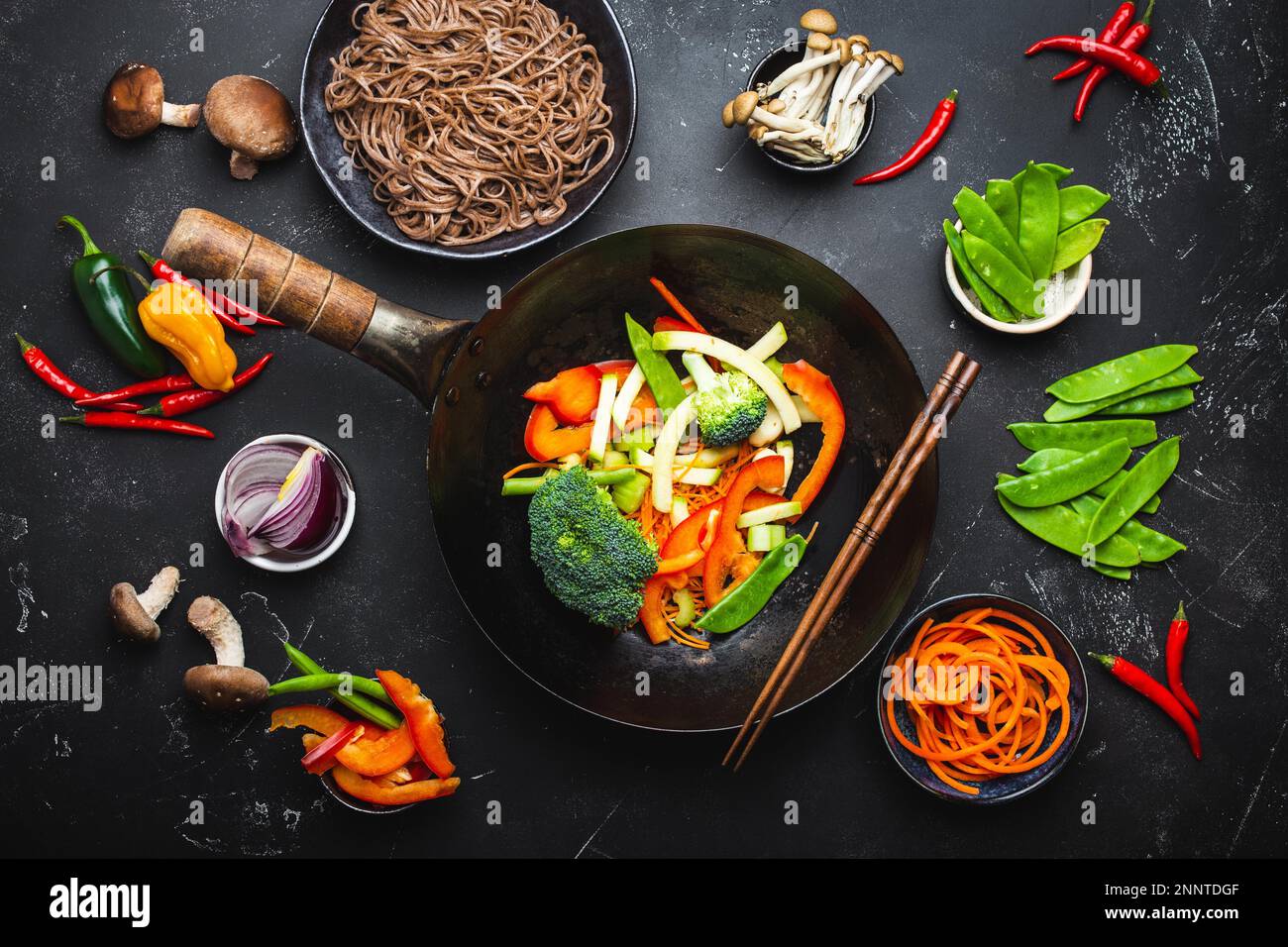 Ingredients for making stirfried noodles soba. Cut fresh vegetables in