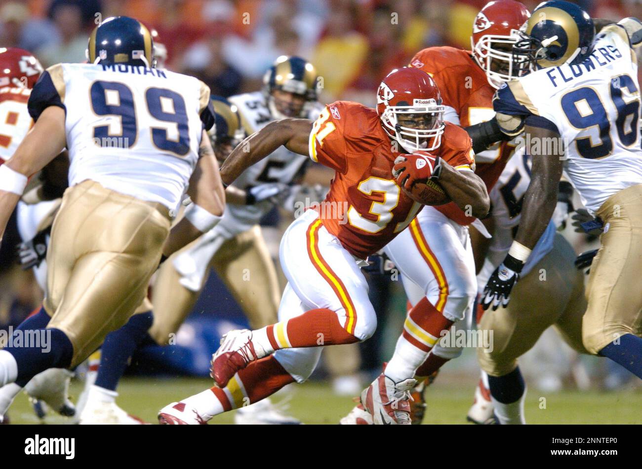 23 AUGUST 2004: Chiefs player Priest Holmes (31) runs the ball against the  Rams in Kansas City Chiefs win 24-7 over the St. Louis Rams at Arrowhead  Stadium in Kansas City, MO.