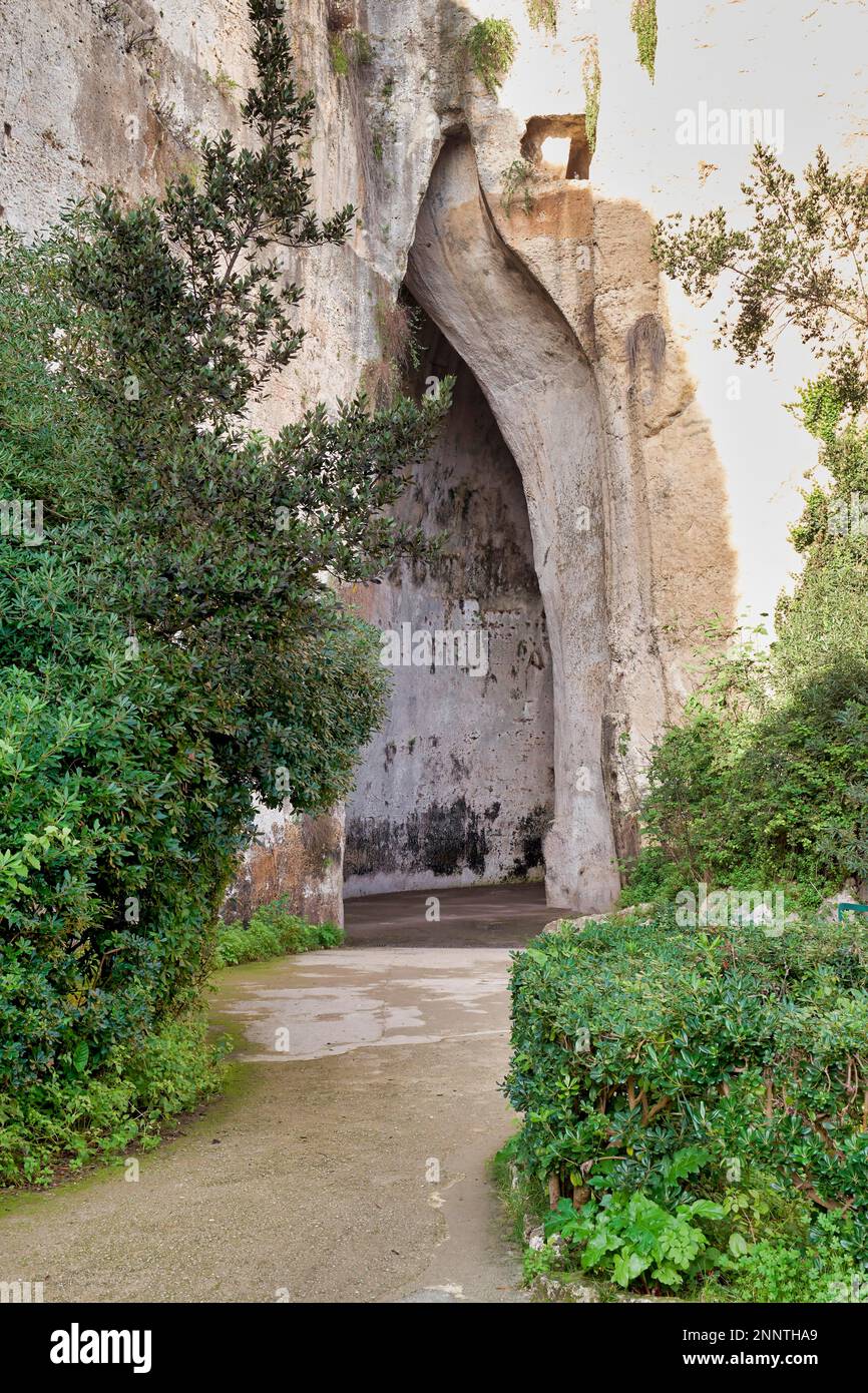 The Ear of Dionysius is a limestone cave carved out of the Temenites