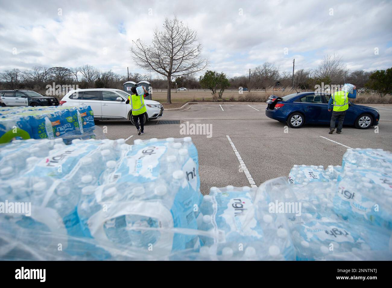 February 21, 2021 Vehicles wait in line at the Onion Creek Soccer