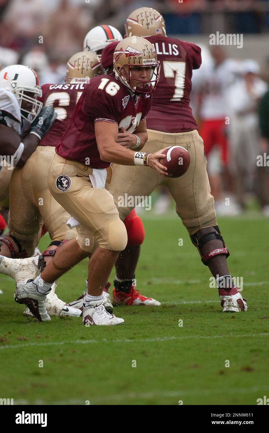 Florida State's quarterback Chris Rix (16) looks to throw as Clemson's  Bryant McNeal (91) tries to take him down during the first half Saturday,  Nov. 3, 2001, at Memorial Stadium in Clemson,