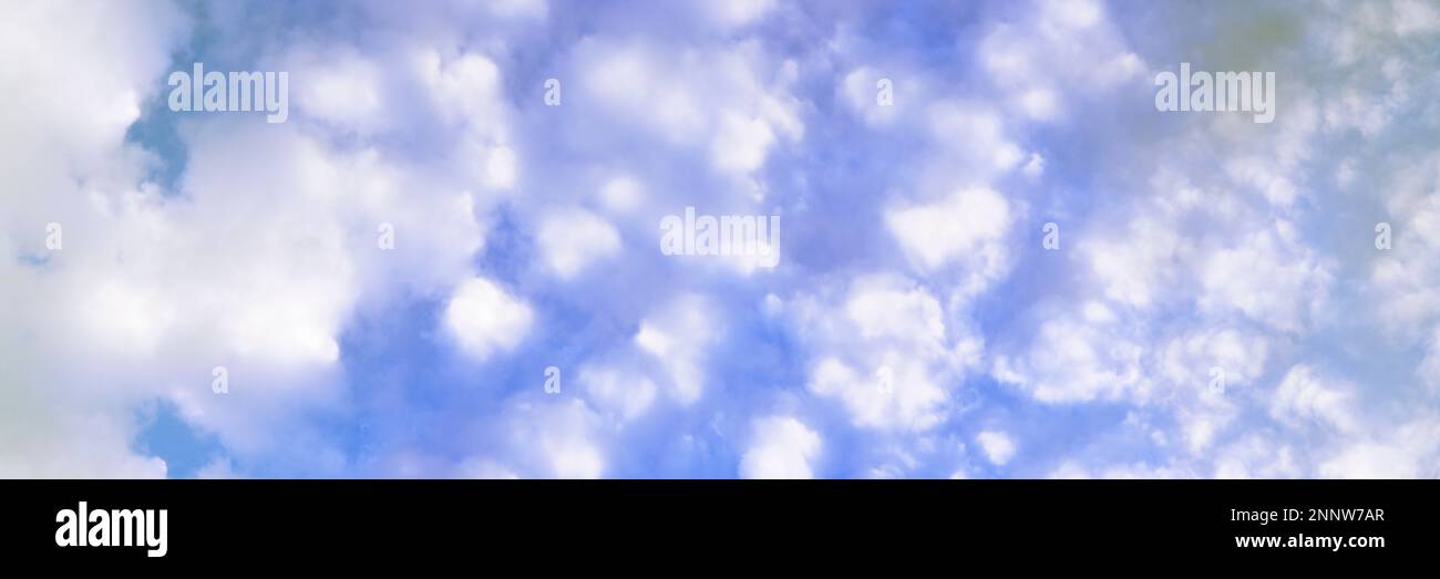 White clouds against blue sky Stock Photo