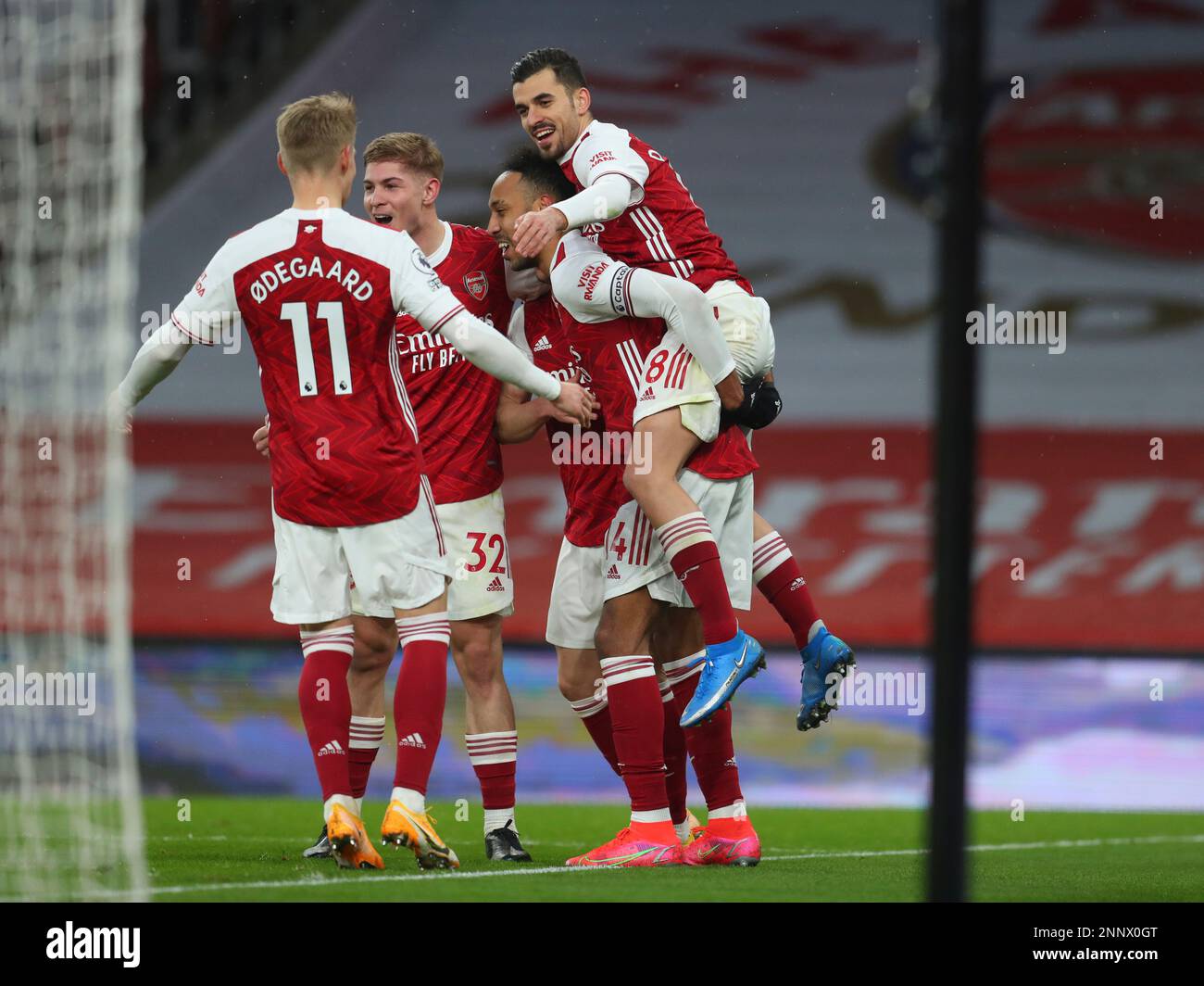 Arsenals Pierre-Emerick Aubameyang, centre, celebrates after scoring his sides second goal during the English Premier League soccer match between Arsenal and Leeds United at the Emirates stadium in London, England, Sunday, Feb.