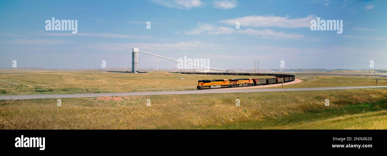 Train between fields, Powder River Basin, Wyoming, USA Stock Photo