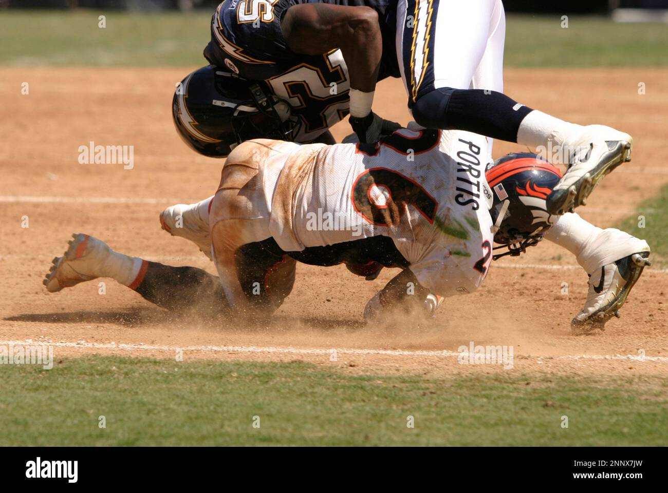 14 September 2003: Clinton Portis, #26, of the Denver Broncos runs with the  ball against the San Diego Chargers during a game at Qualcomm Stadium in  San Diego, CA. Mandatory Credit: Francis