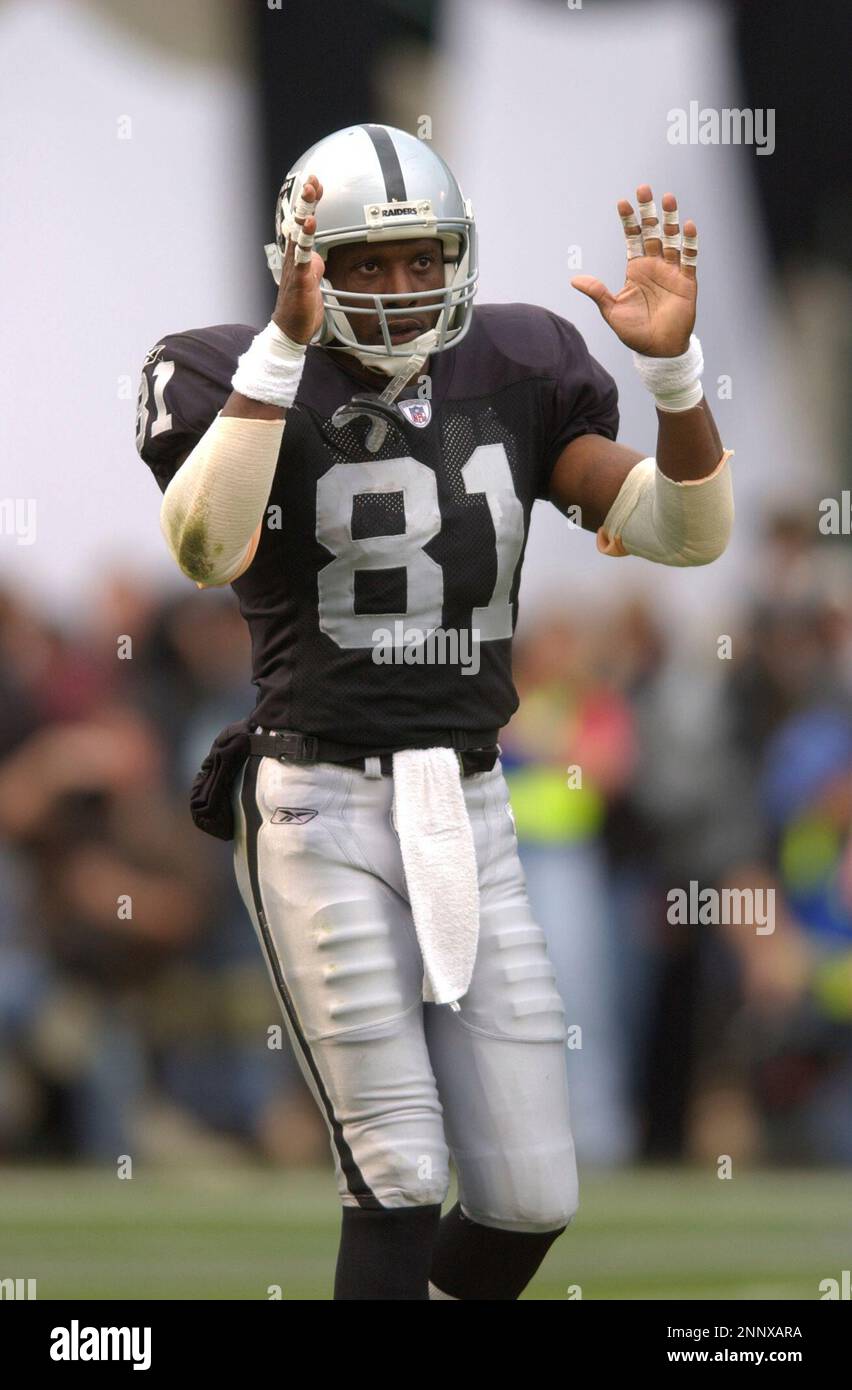 12 JAN 2003: Oakland Raiders Tim Brown during a playoff game against the  New York Jets on Sunday January 12, 2003, in Oakland, CA. (Icon Sportswire  via AP Images Stock Photo - Alamy