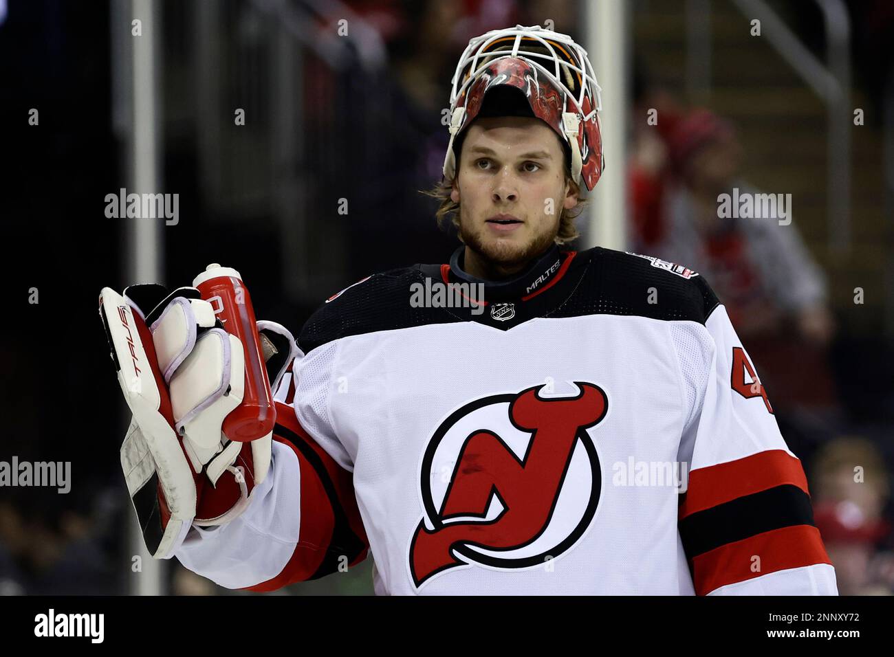 New Jersey Devils goaltender Akira Schmid skates off the ice after losing  to the Dallas Stars in an NHL hockey game Tuesday, Jan. 25, 2022, in  Newark, N.J. The Stars won 5-1. (