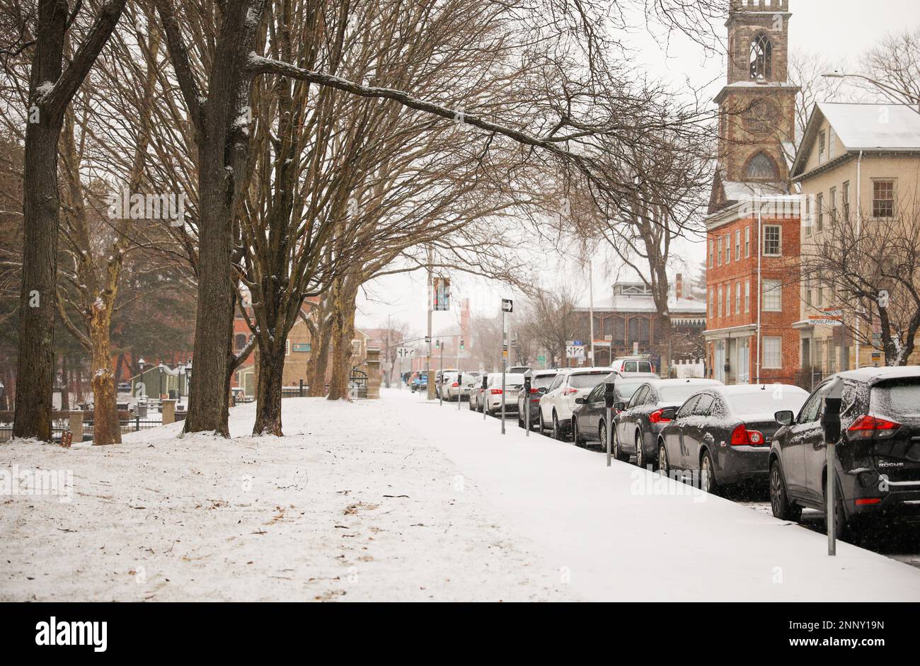 city streets during winter during snow fall urban Stock Photo