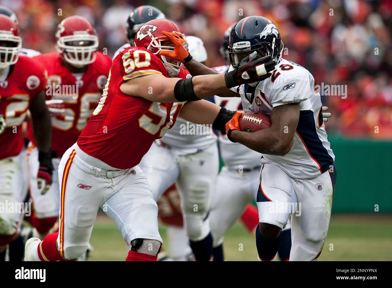 6 December 2009: Denver Broncos running back Correll Buckhalter (28) is  pursued by Kansas City Chiefs safety Mike Brown (30) during the Broncos 44-13  win over the Chiefs at Arrowhead Stadium in