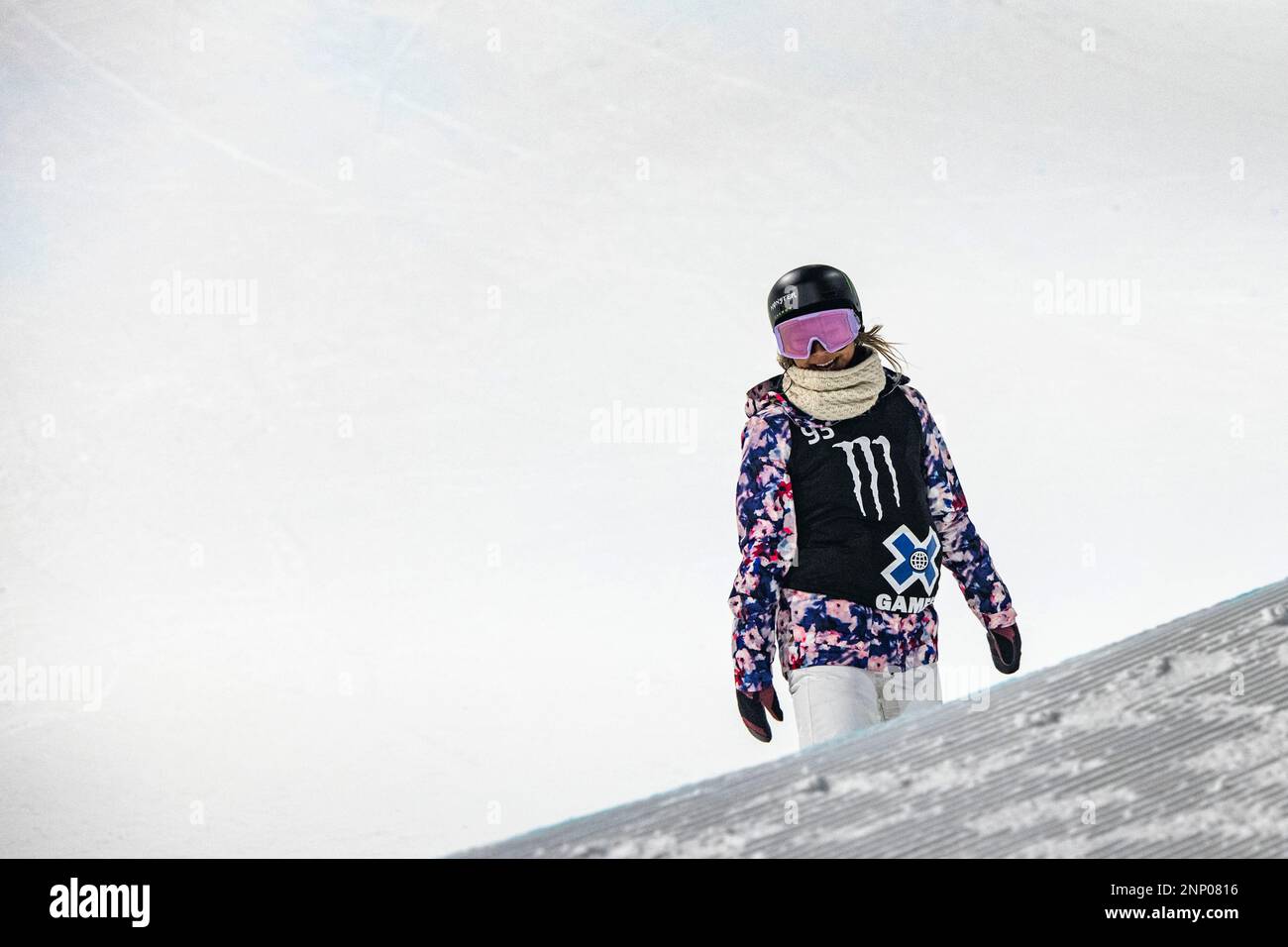 Chloe Kim rides out of the superpipe after her last run during the