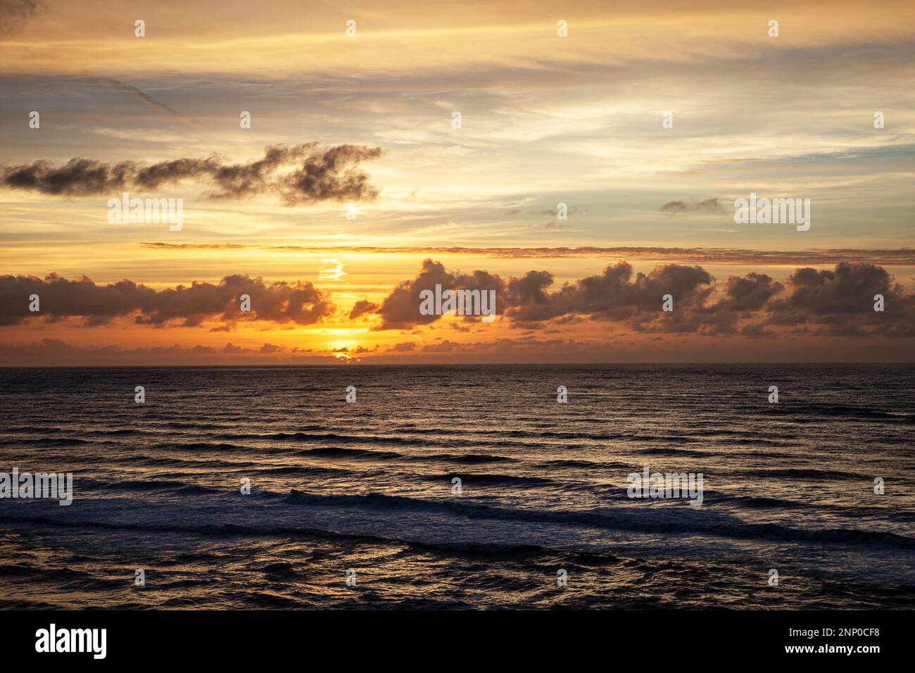 WA23118-00...WASHINGTON - Sunset over the Pacific Ocean from North Head in Cape Disappointment State Park. Stock Photo
