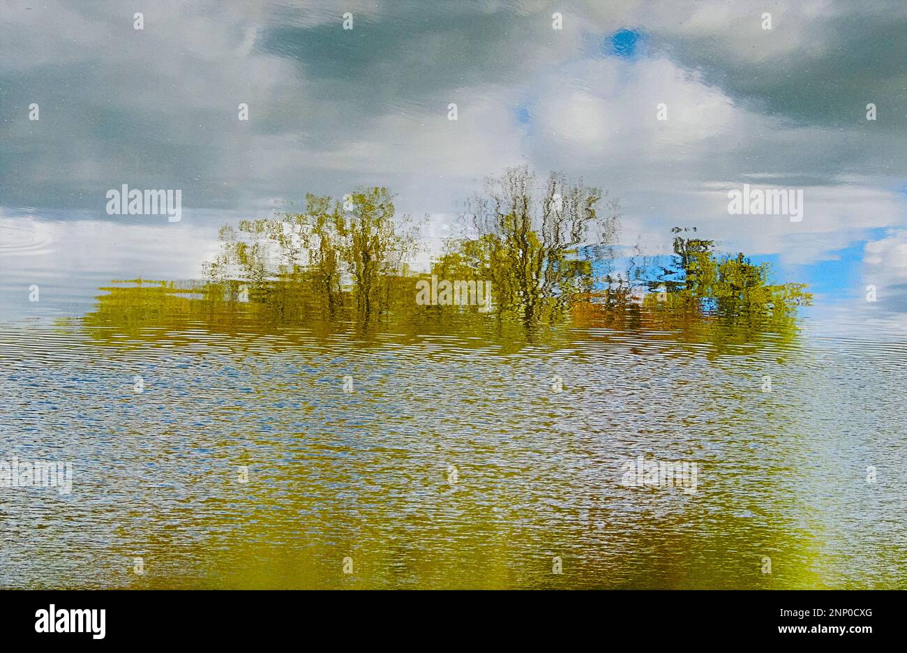 Abstract photograph of ripples and reflections in water Stock Photo - Alamy