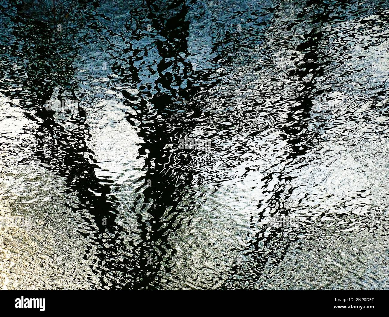 Abstract photograph of ripples and reflections in water Stock Photo