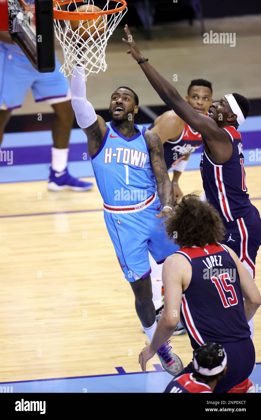 Houston Rockets' John Wall drives to the net against Washington Wizards ...