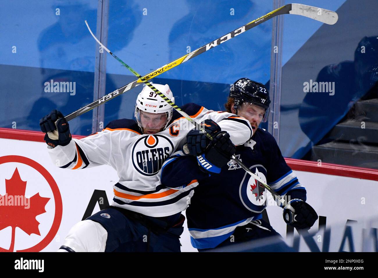Winnipeg Jets' Mason Appleton (22) collides with Edmonton Oilers