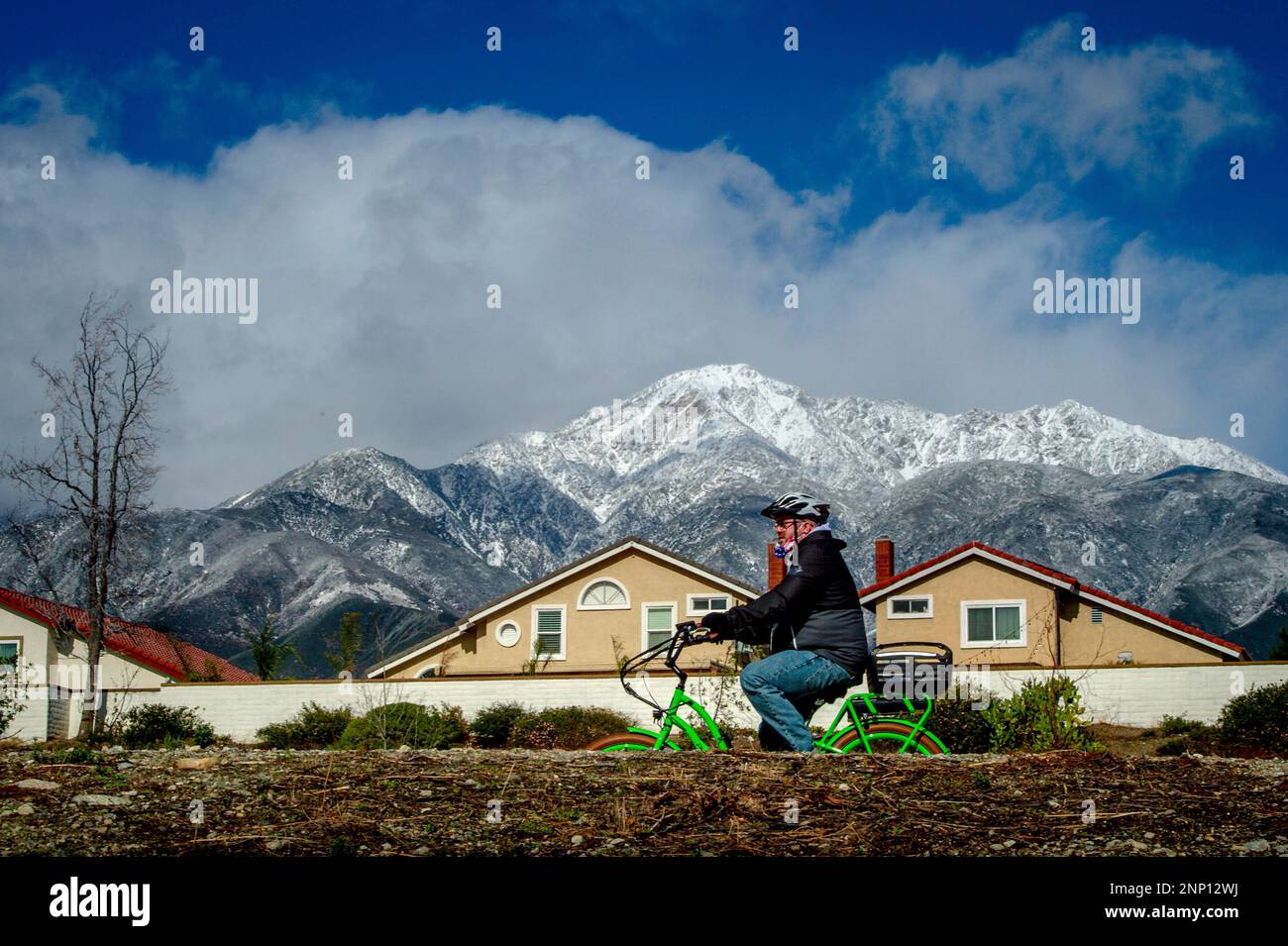 A cyclist rides a bike along the Pacific Electric Trail in Rancho