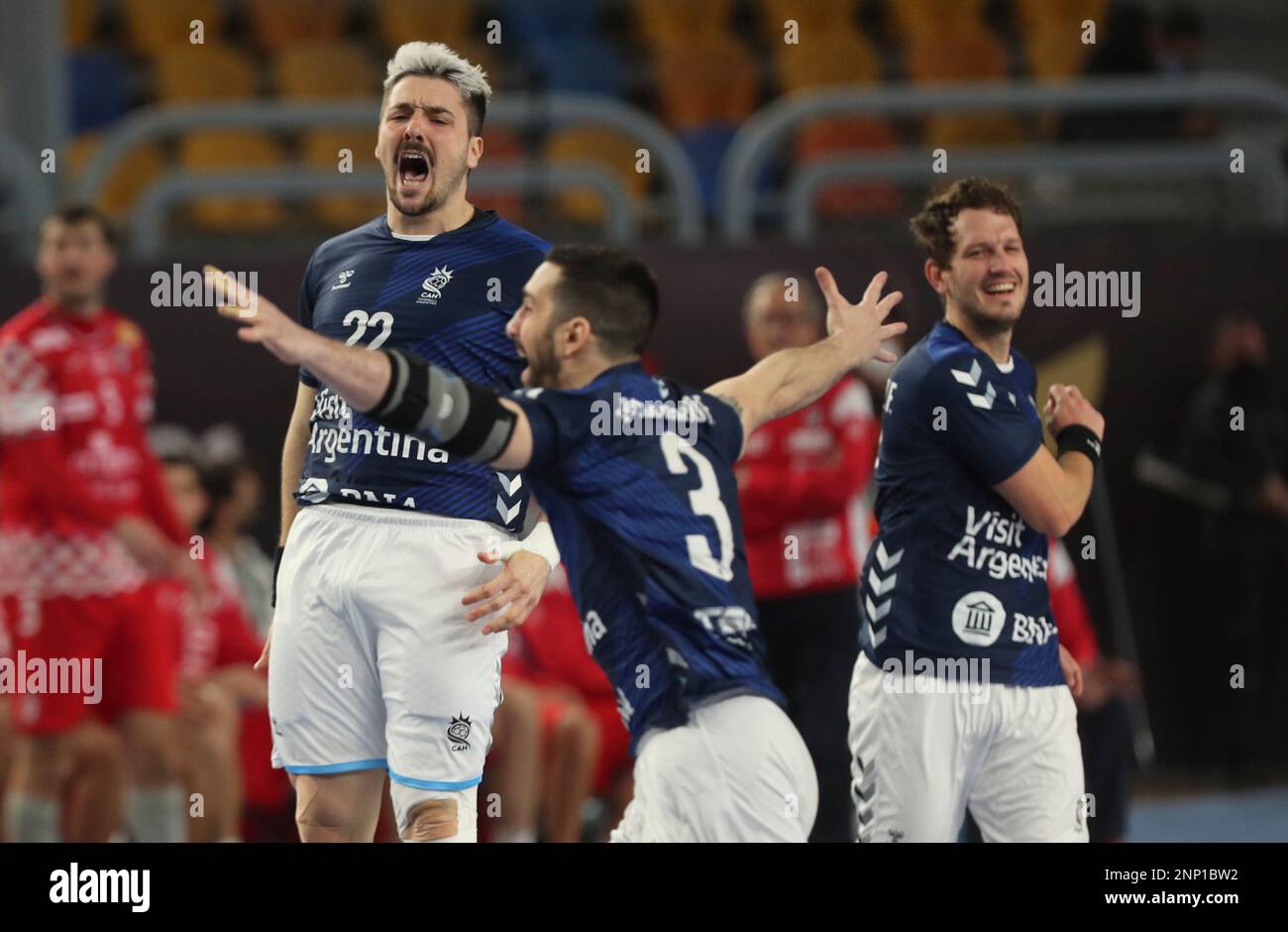 Argentinas players celebrate during the World Handball Championship against Croatia in Cairo, Egypt, Satruday, Feb