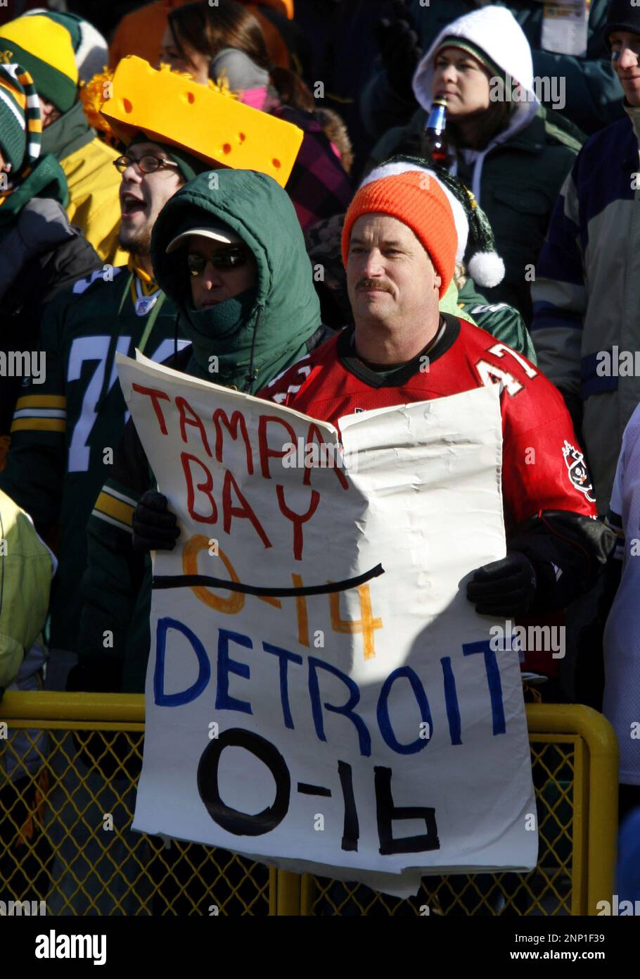 28 December 2008: Fans greet the Detroit Lions with a sign that eludes to  the fact with a loss to the Green Bay Packers the Lions will become the  first NFL team