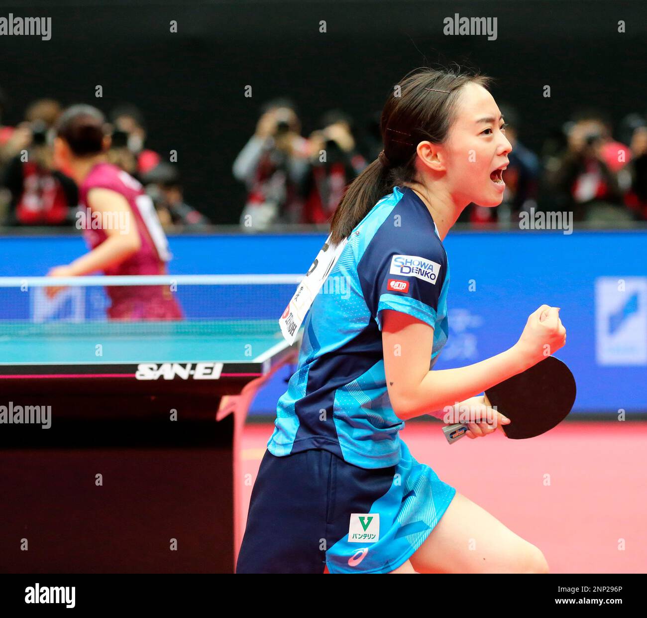 Japanese table tennis player Kasumi Ishikawa celebrates after defeating
