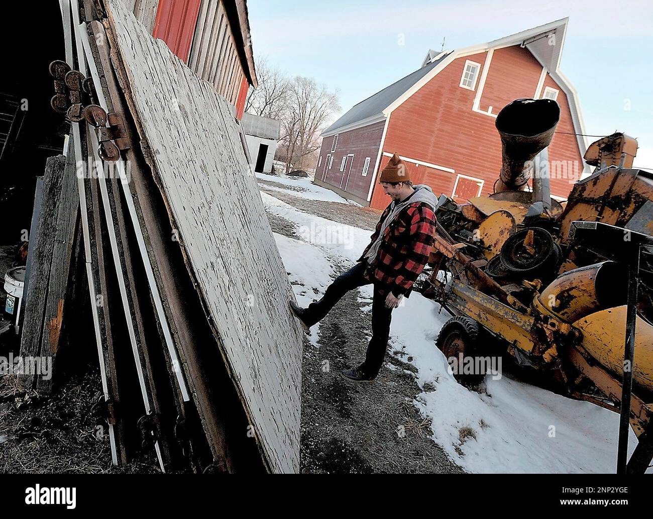 With the restored barn behind him, Matt Mitchell looks over the