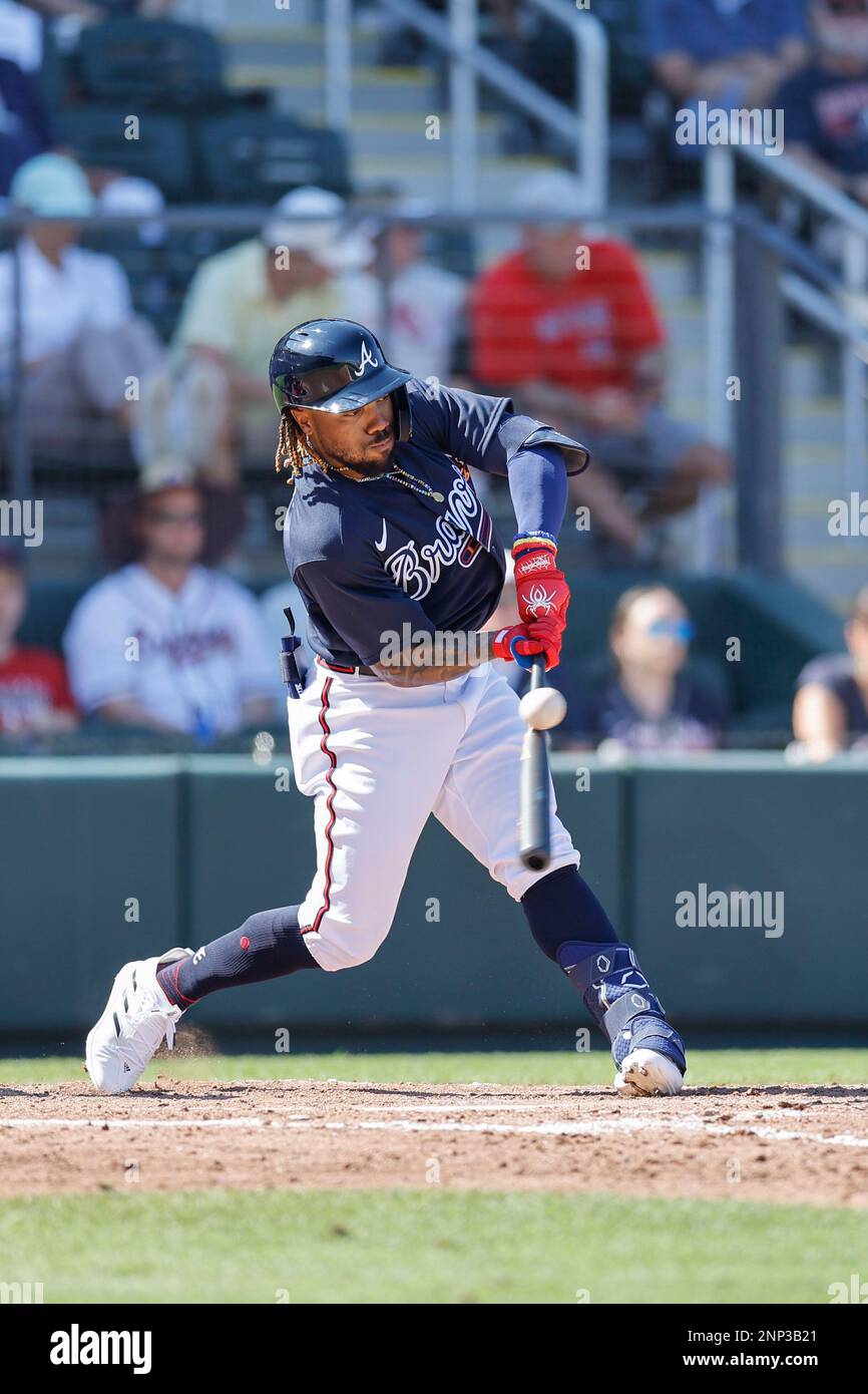 North Port FL USA: Atlanta Braves outfielder Justin Dean (38) hits a fly ball to center field during an MLB spring training game against the Boston Re Stock Photo