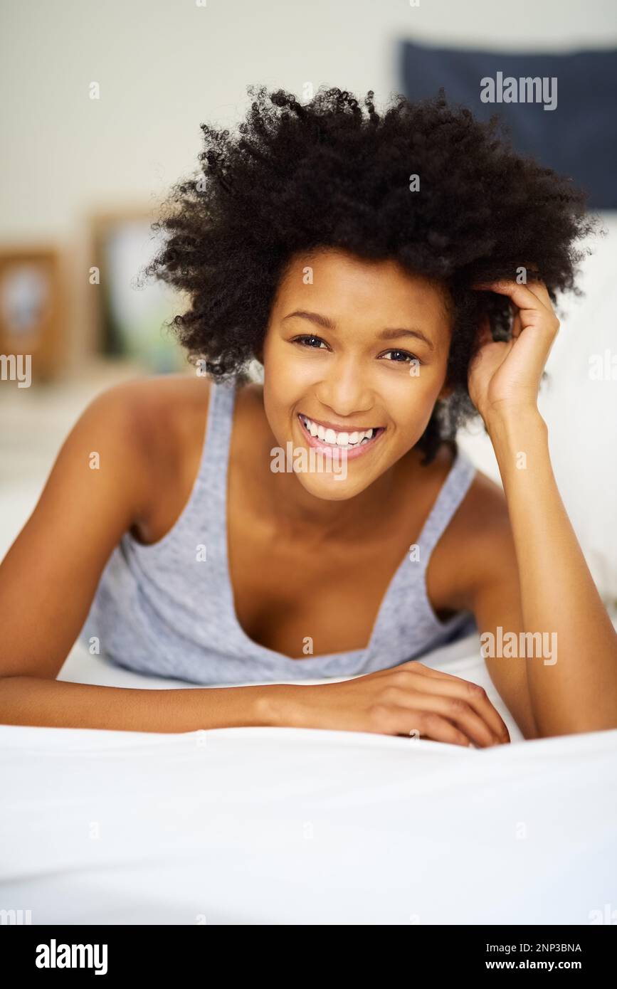 Rise and shine Dont mind if I do. Portrait of a happy young woman