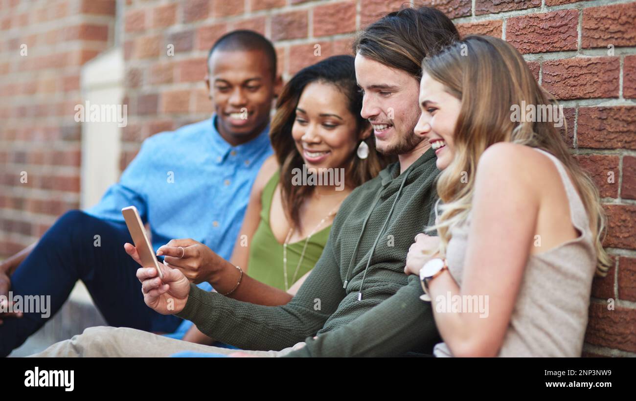 Am Using Friend Good friends share cool things with each other. a group of young ...