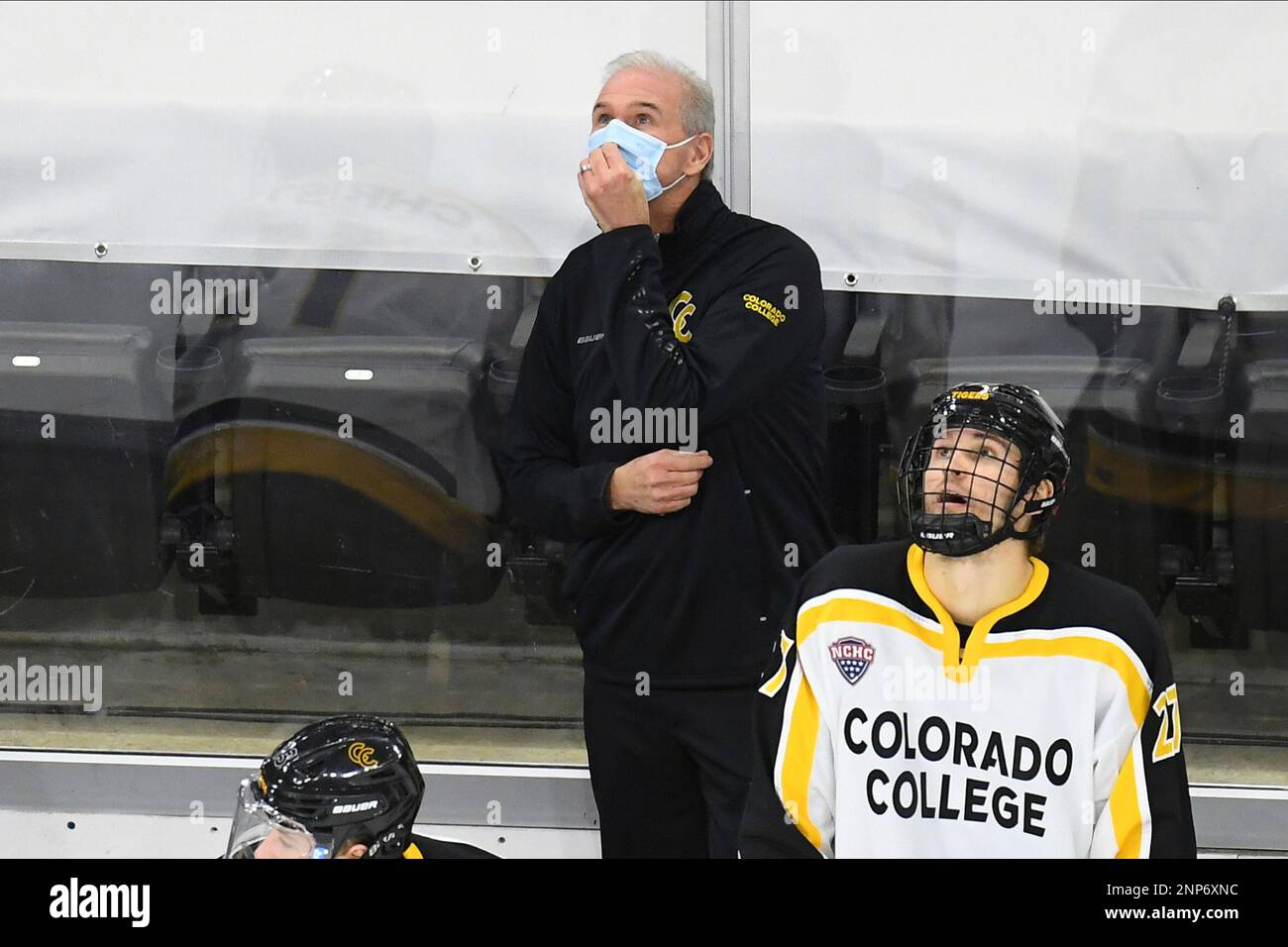 December 8, 2020 Colorado College Tigers head coach Mike Haviland checks the scoreboard during a NCAA D1 mens hockey game between the Western Michigan Broncos and the Colorado College Tigers at Baxter