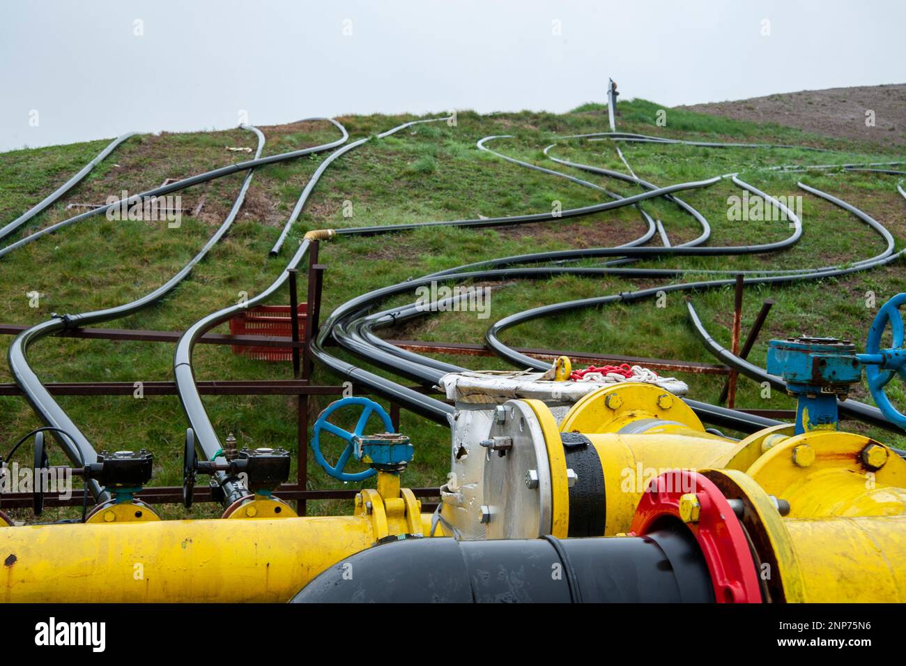 Gas production and distribution pipes. Gas pipeline and methane pipeline in panorama. Stock Photo