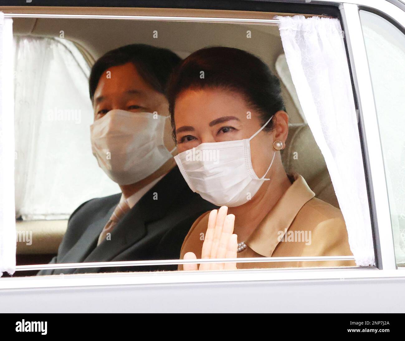 Japanese Emperor Naruhito and Empress Masako enter the Imperial Palace