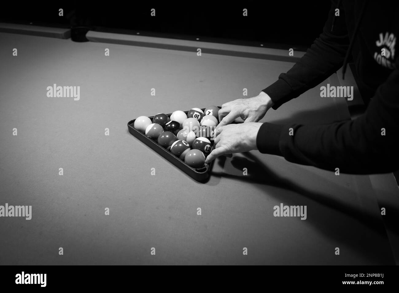Billiard balls are sorted on the billiard table Stock Photo