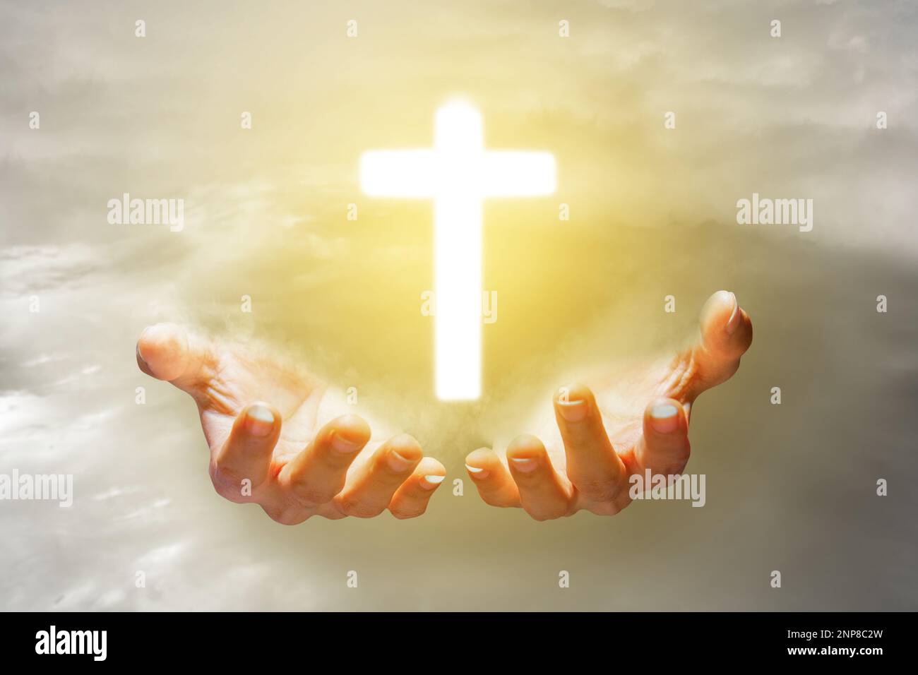 Human hand showing Christian cross with sunset sky background Stock ...
