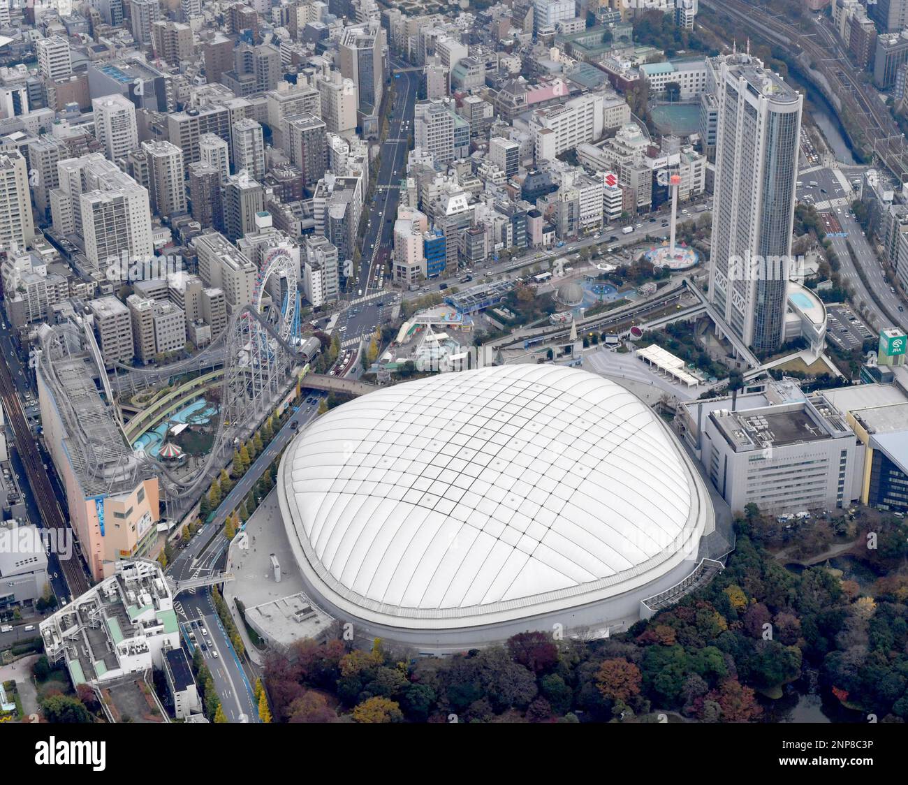 An aerial photo shows Tokyo Dome in Bunkyo Ward, Tokyo on November 27,  2020. Tokyo Dome is a stadium and has a maximum total capacity of 57,000  depending on configuration, with an