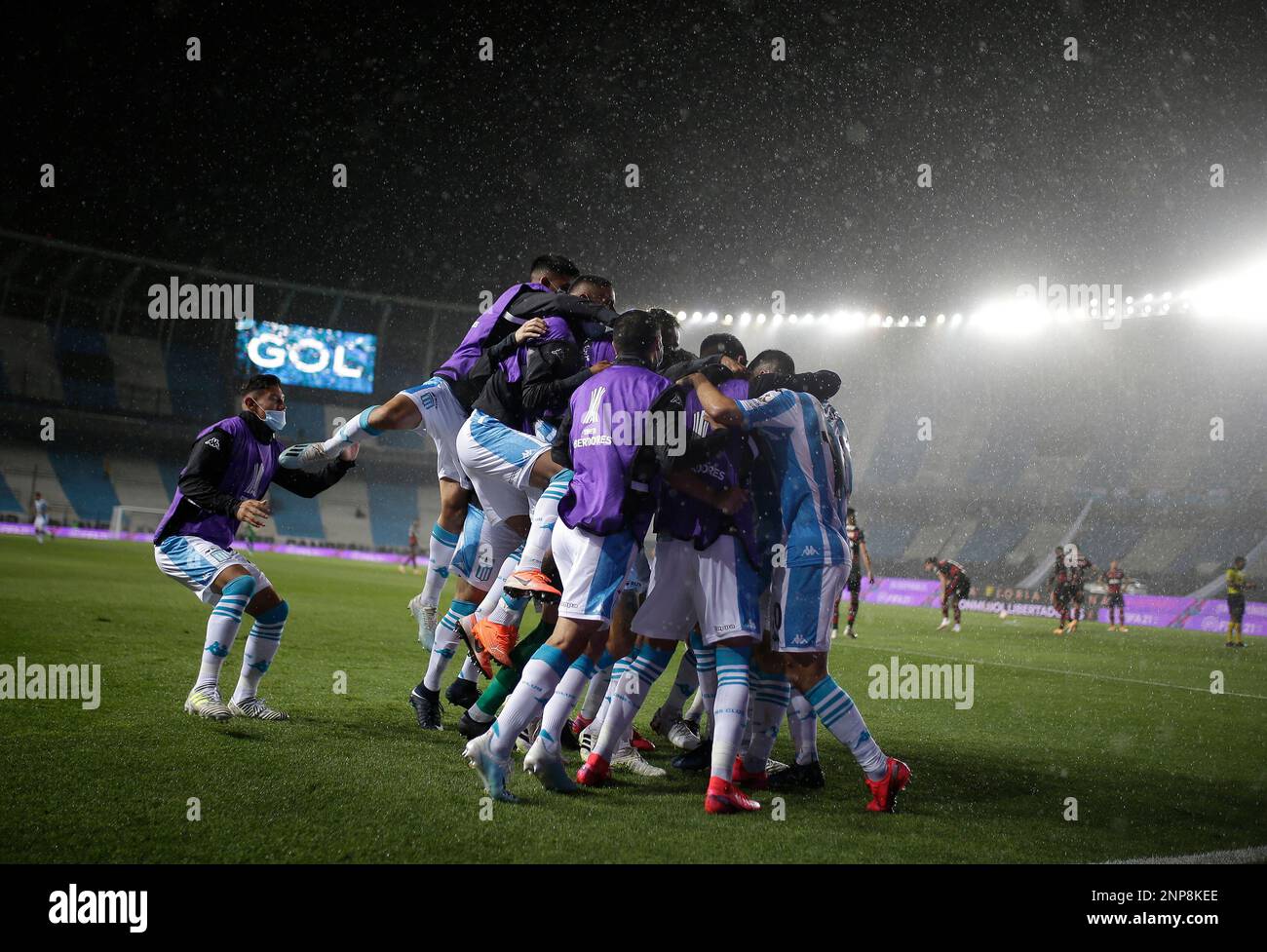 Hector Fertoli of Argentina's Racing Club celebrates with teammates after scoring his side's opening goal against Brazil's Flamengo during a Copa Libertadores soccer match in Buenos Aires, Argentina, Tuesday, Nov. 24, 2020.(Juan Roncoroni/Pool via AP) Stock Photo