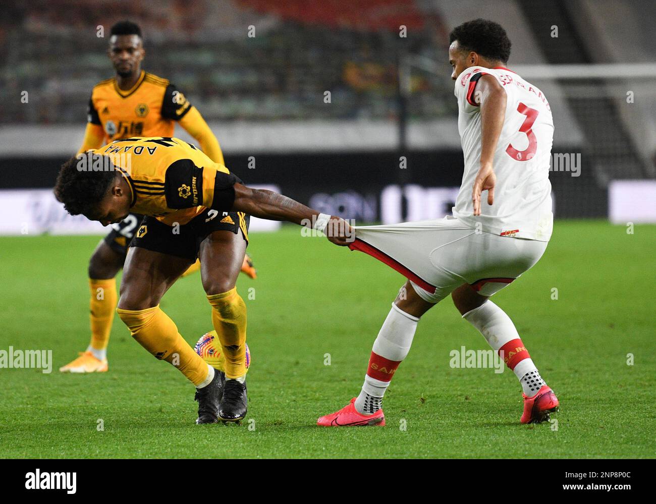 Wolverhampton Wanderers' Adama Traore grabs the shorts of Southampton's  Ryan Bertrand (right) during the Premier League match at Molineux,  Wolverhampton Stock Photo - Alamy