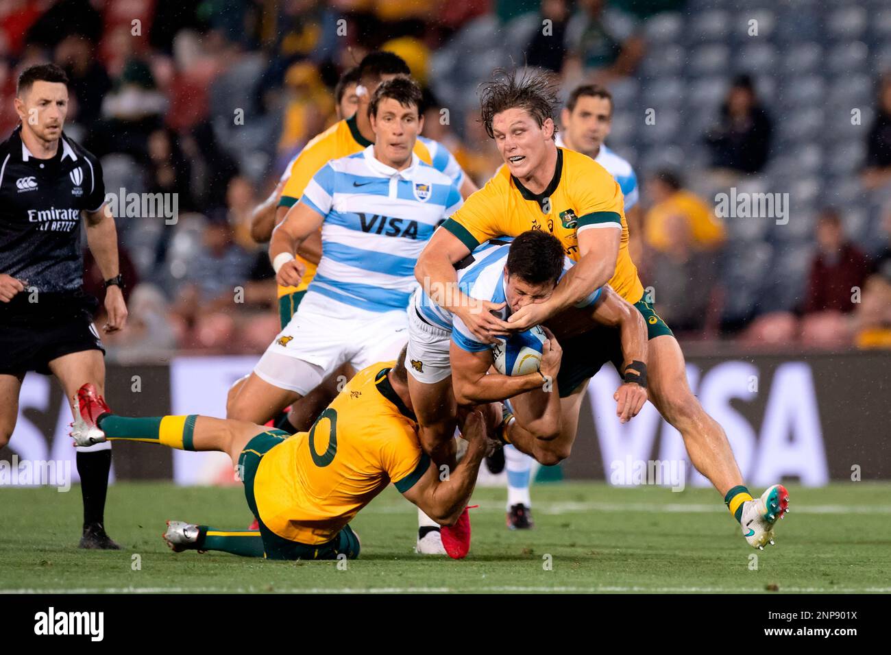 NEWCASTLE, AUSTRALIA - NOVEMBER 21: Bautista Delguy of the Pumas hit in a  big tackle by Michael Hooper of the Wallabies during the Tri-Nations round  4 rugby match between the Argentina Pumas