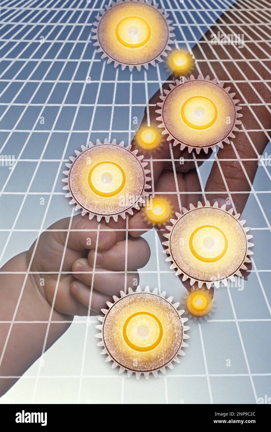 INTERLOCKING COG GEARS OVER MOTHER HOLDING INFANT BABY HANDS Stock Photo