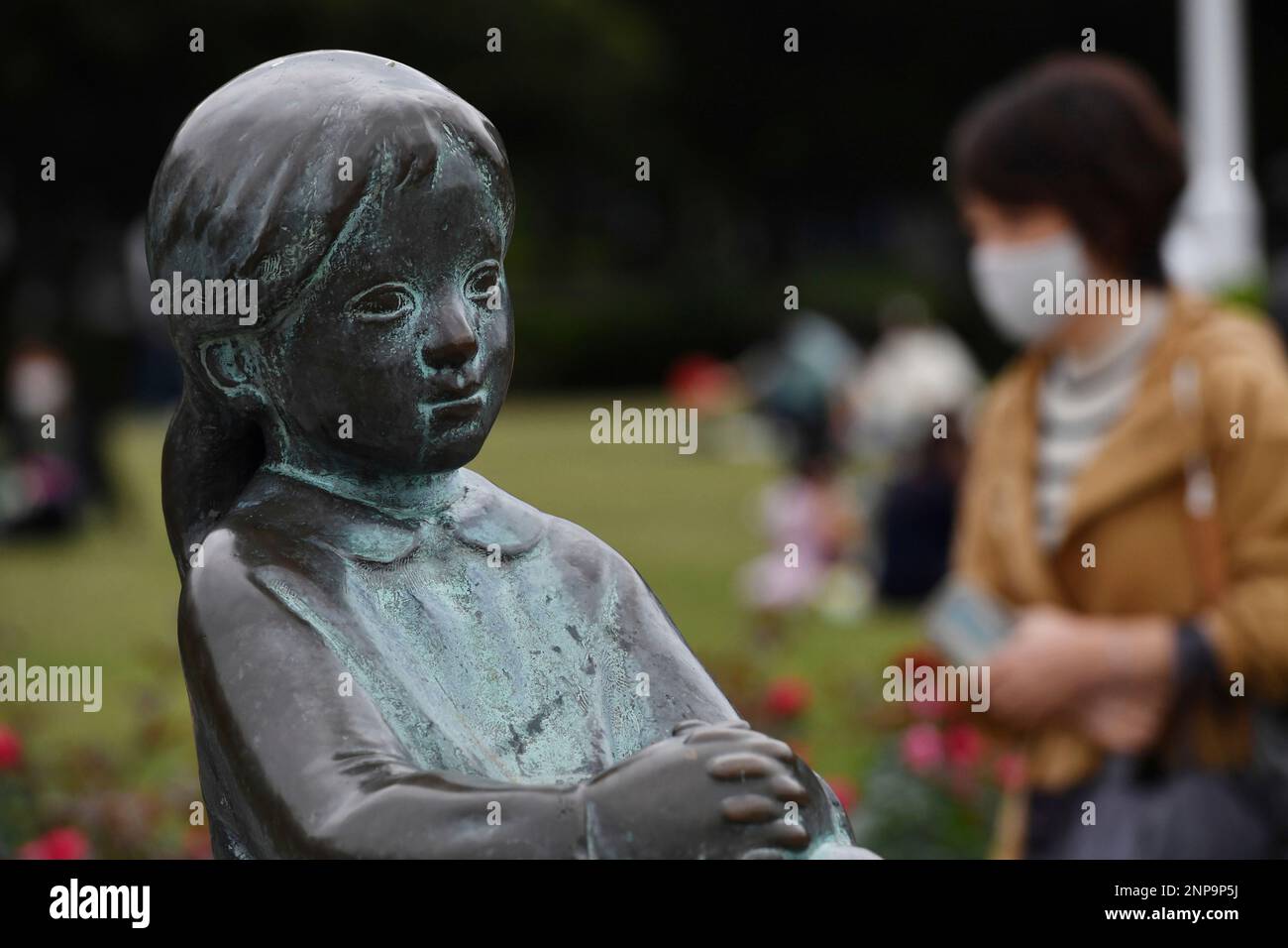 A picture taken on Nov. 1, 2020 shows a statue of the "Little Girl With Red Shoes On" statue at