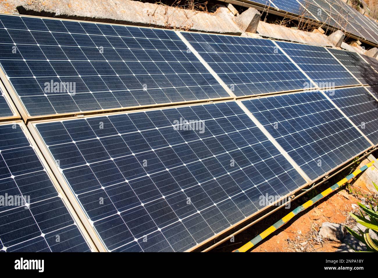 Dusty solar panels surface requires maintenance and cleaning. Solar